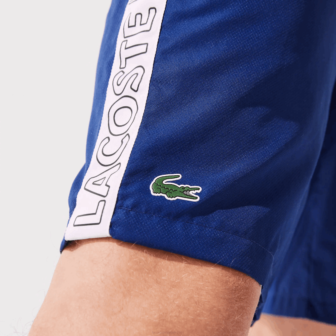 bleu blanc emj V6HV1505 Hommes Lacoste short à bandes latérales avec logo sport