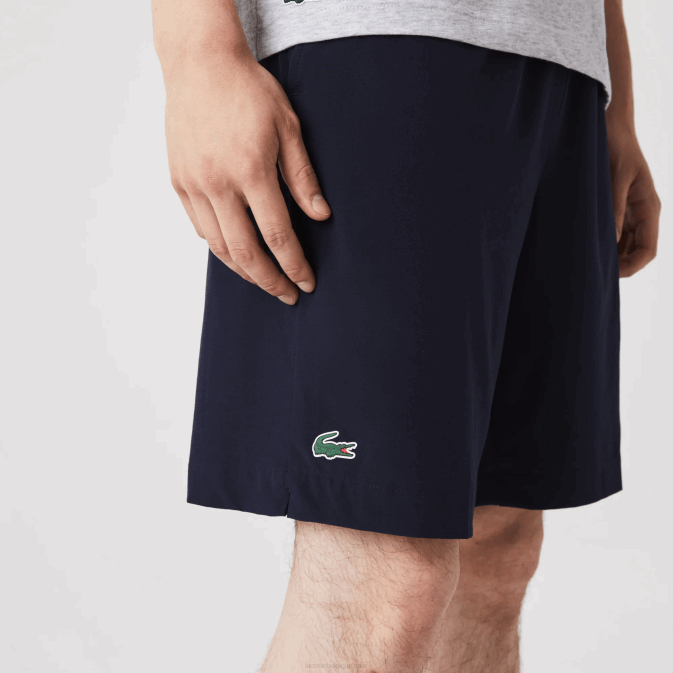 bleu marine blanc 525 V6HV1411 Hommes Lacoste short de sport ultra léger