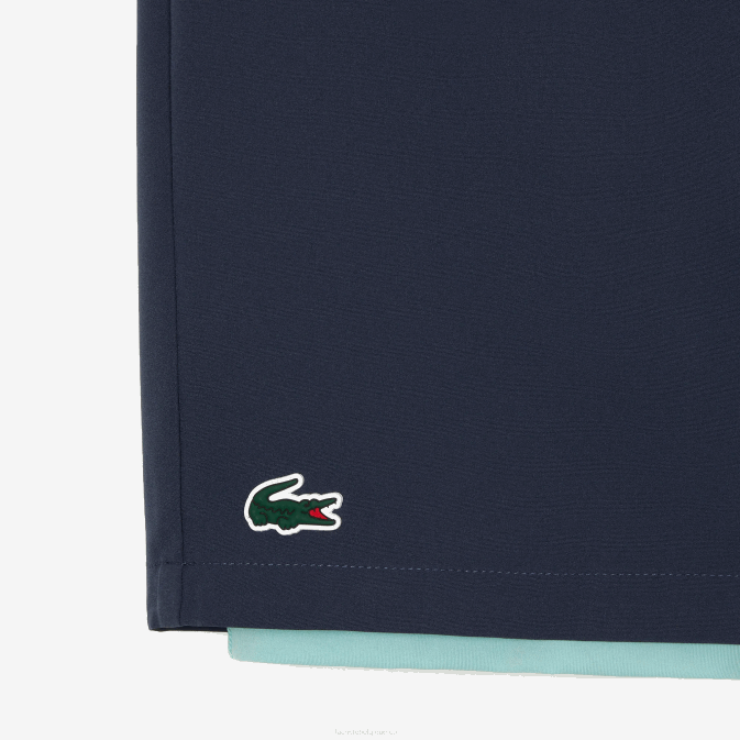 bleu vert clair b00 V6HV480 Hommes Lacoste short de sport bicolore avec sous-short intégré