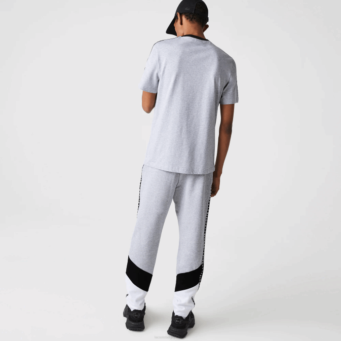 gris chine noir blanc sj1 V6HV1148 Hommes Lacoste pantalon de jogging en polaire color block à rayures emblématiques