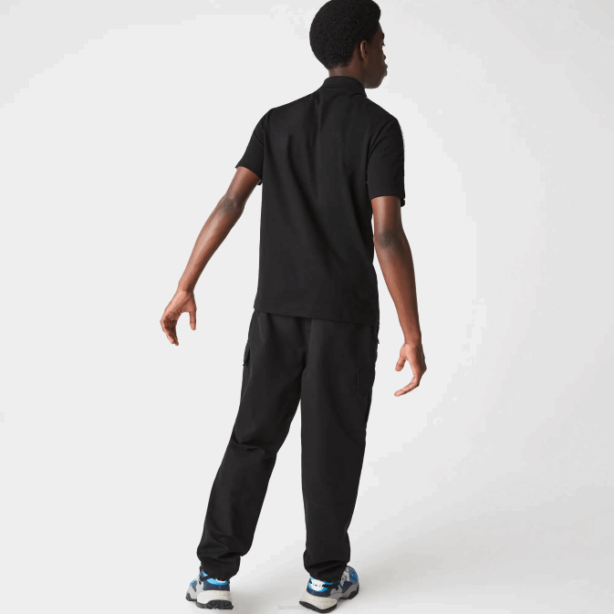 noir 031 V6HV816 Hommes Lacoste polo en coton ultra-léger à bande lettrée