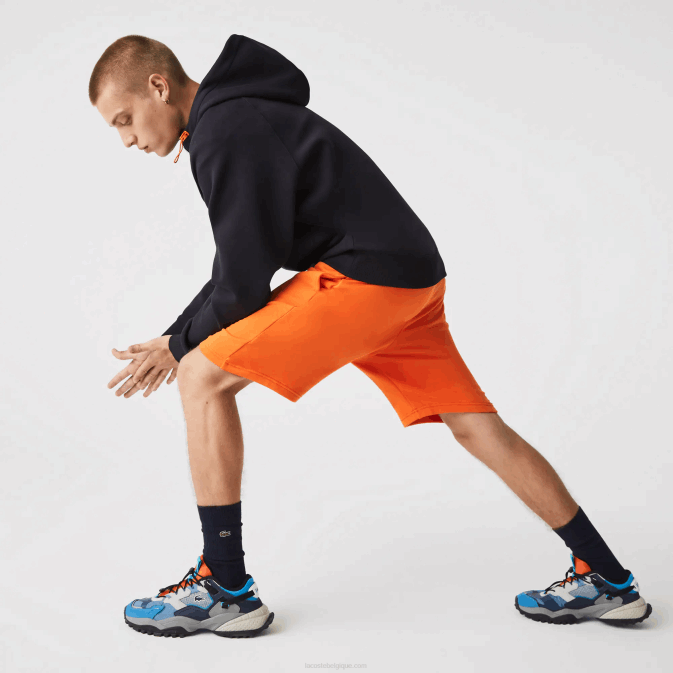 télé orange1 V6HV1577 Hommes Lacoste short de tennis en polaire sport
